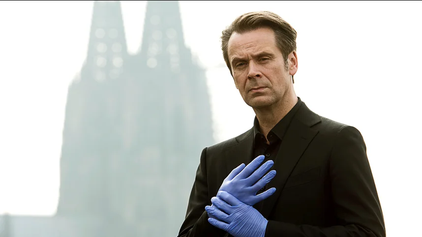 Профессор Т.